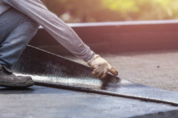 Professional Basement Waterproofing technician working in Arcanum, OH